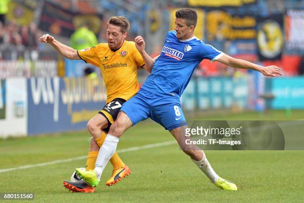 Andreas Lambertz of Dresden and Tim Hoogland of Bochum battle for the ball during the Second Bundesliga match between VfL Bochum and SG Dynamo...