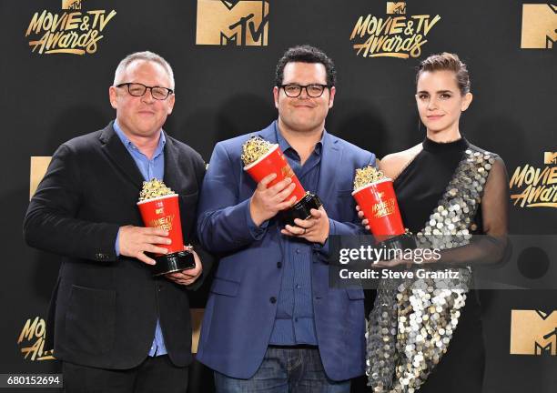 Director Bill Condon and actors Josh Gad and Emma Watson, winners of Movie of the Year for 'Beauty and the Beast', pose in the press room at the 2017...