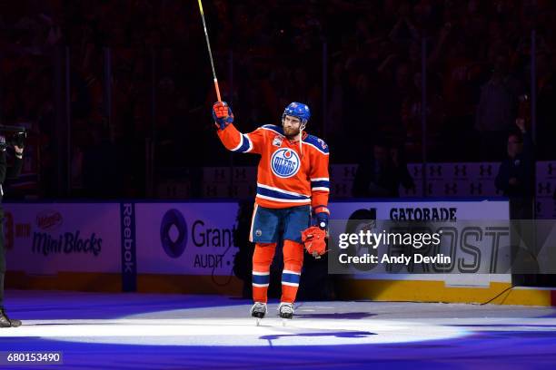 Leon Draisaitl of the Edmonton Oilers salutes the the crowd after being selected as the first star following Game Six of the Western Conference...