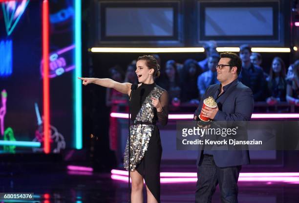 Actors Emma Watson and Josh Gad accept the Movie of the Year award for 'Beauty and the Beast' onstage during the 2017 MTV Movie And TV Awards at The...