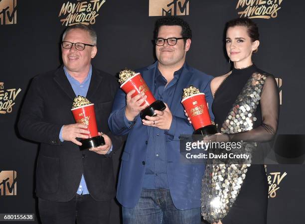 Director Bill Condon and actors Josh Gad and Emma Watson, winners of Movie of the Year for 'Beauty and the Beast,' pose in the press room during the...