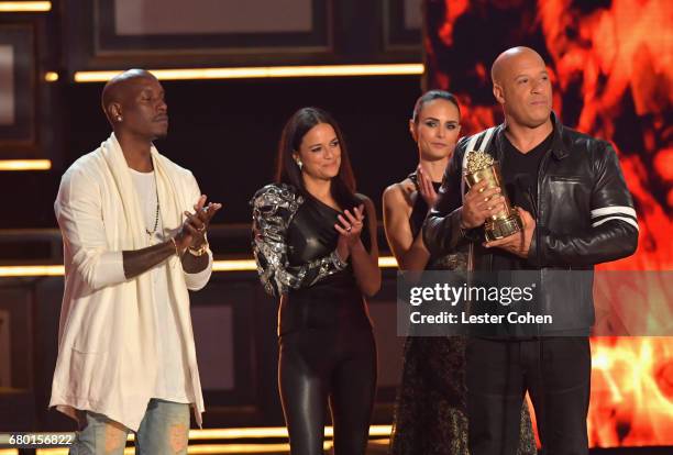 Actors Tyrese Gibson, Michelle Rodriguez, Jordanna Brewster and Vin Diesel speak onstage during the 2017 MTV Movie And TV Awards at The Shrine...
