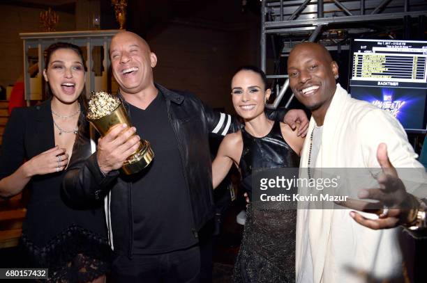 Actor Gal Gadot poses with actors Vin Diesel, Jordana Brewster, and Tyrese Gibson, who accepted the MTV Generation Award on behalf of 'The Fast and...