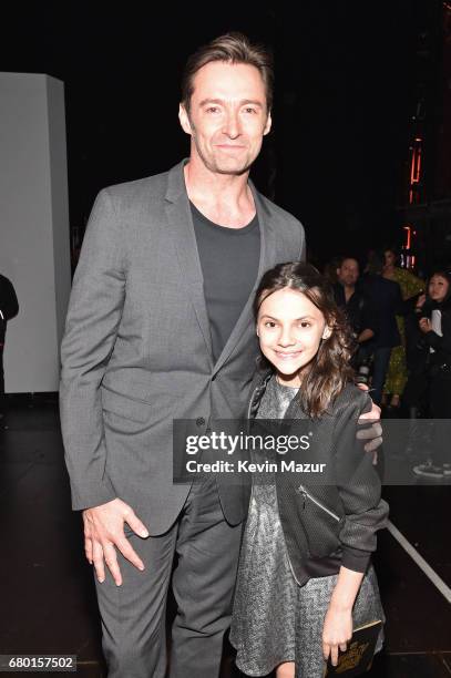 Actors Hugh Jackman and Dafne Keen attend the 2017 MTV Movie And TV Awards at The Shrine Auditorium on May 7, 2017 in Los Angeles, California.