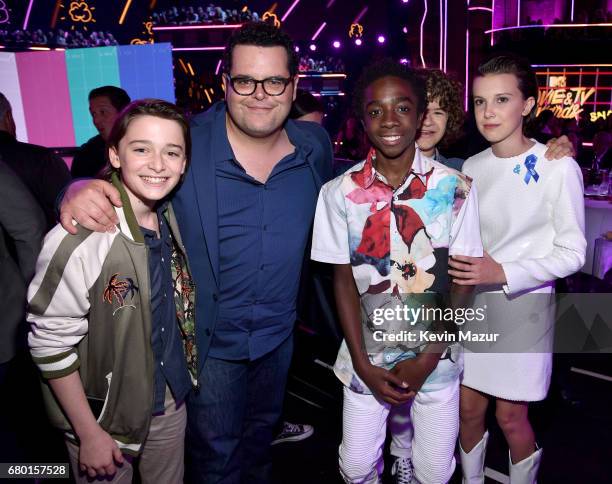 Actors Noah Schnapp, Josh Gad, Caleb McLaughlin, Gaten Matarazzo, and Millie Bobby Brown attend the 2017 MTV Movie And TV Awards at The Shrine...