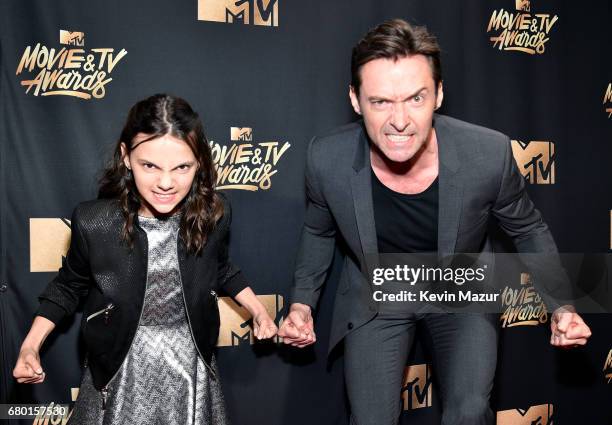 Actors Hugh Jackman and Dafne Keen attend the 2017 MTV Movie And TV Awards at The Shrine Auditorium on May 7, 2017 in Los Angeles, California.