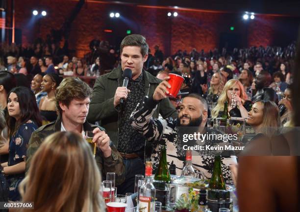 Actor Anders Holm, host Adam DeVine, and DJ Khaled attend the 2017 MTV Movie And TV Awards at The Shrine Auditorium on May 7, 2017 in Los Angeles,...