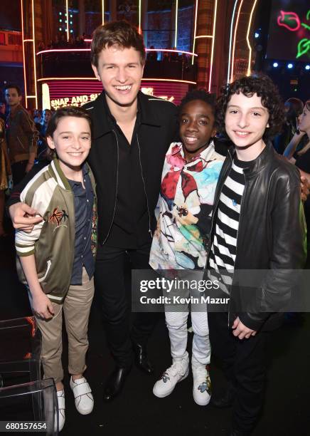 Actors Noah Schnapp, Ansel Elgort, Caleb McLaughlin, and Finn Wolfhard attends the 2017 MTV Movie And TV Awards at The Shrine Auditorium on May 7,...