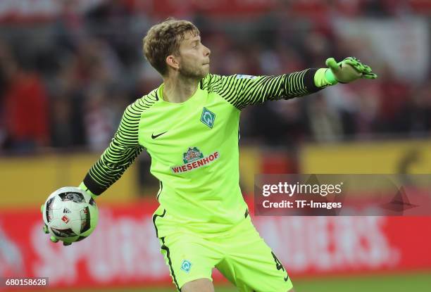 Goalkeeper Felix Wiedwald of Bremen wirft den Ball controls the ball during to the Bundesliga match between 1. FC Koeln and Werder Bremen at...