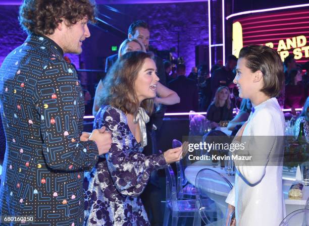 Actors Brett Dier, Haley Lu Richardson and Millie Bobby Brown attend the 2017 MTV Movie And TV Awards at The Shrine Auditorium on May 7, 2017 in Los...