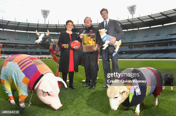 Jaala Pulford, the Minister for Agriculture and Regional Development, Kevin Sheedy and AFL CEO Gillon McLachlan pose during the 2017 Powercor Country...