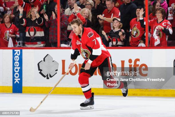 The first star of the game Kyle Turris of the Ottawa Senators skates off the ice following their overtime win against the New York Rangers in Game...