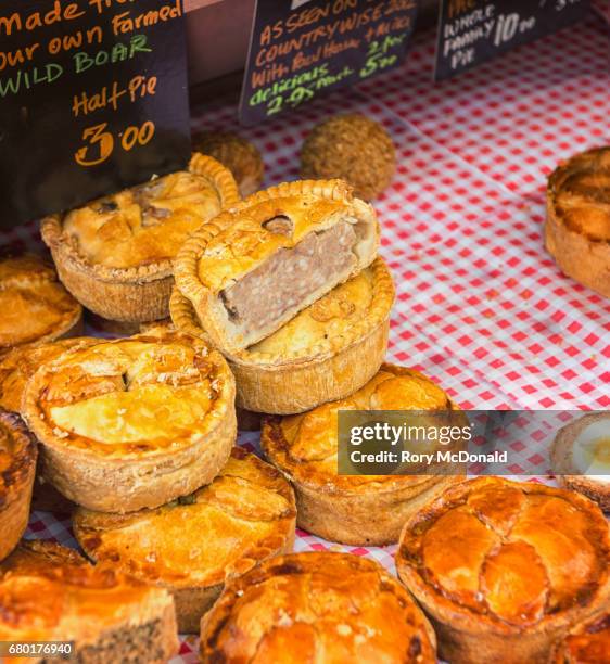 pork pies on sale at a farmers market - meat pie stock pictures, royalty-free photos & images