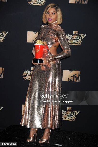 Actress Taraji P. Henson, winner of Best Fight Against the System for "Hidden Figures", poses in the press room during the 2017 MTV Movie And TV...
