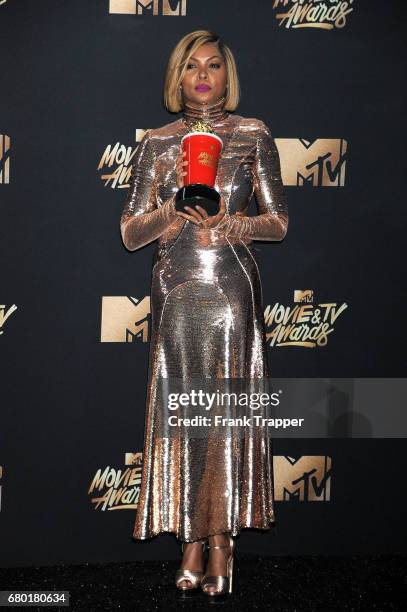 Actress Taraji P. Henson, winner of Best Fight Against the System for "Hidden Figures", poses in the press room during the 2017 MTV Movie And TV...