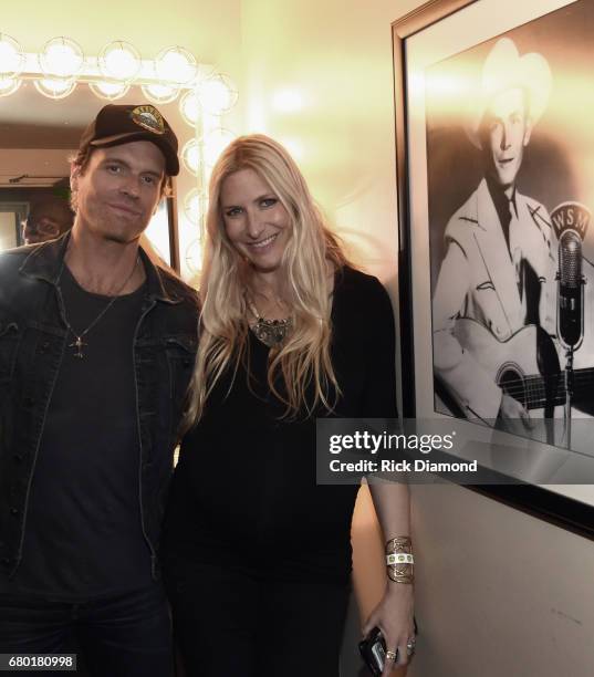 Singer/Songerwriter Chris Coleman with Singer/Songwriter/Grand-Daughter of Hank Williams Sr., Holly Williams pose by Hank Sr. Photograph in the Hank...