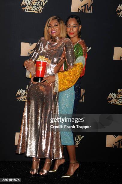 Actors Tracee Ellis Ross and Taraji P. Henson, winner of Best Fight Against the System for "Hidden Figures", pose in the press room during the 2017...