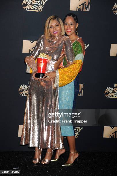 Actors Tracee Ellis Ross and Taraji P. Henson, winner of Best Fight Against the System for "Hidden Figures", pose in the press room during the 2017...