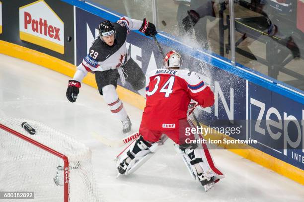 Goalie Petr Mrazek vies with Nathan MacKinnon during the Ice Hockey World Championship between Czech Republic and Canada at AccorHotels Arena in...