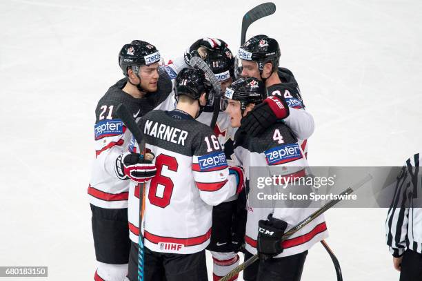 Tyson Barrie celebrates his goal with teammates during the Ice Hockey World Championship between Czech Republic and Canada at AccorHotels Arena in...