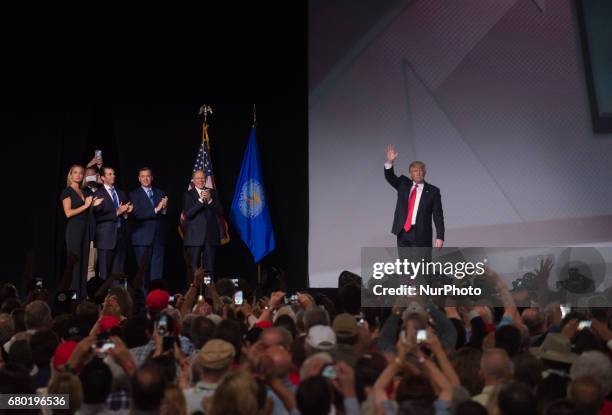 President Donald Trump arrives to address the National Rifle Association Leadership Forum in Atlanta, Georgia on April 28, 2017. For the first time...