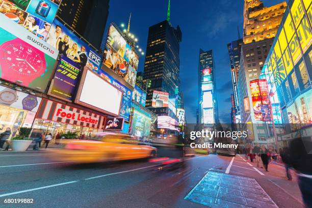 times square new york city taxi traffic - the uptown theater stock pictures, royalty-free photos & images