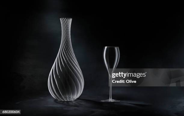 carafe  and glass of wine on dark beckground - verre à vin stock pictures, royalty-free photos & images