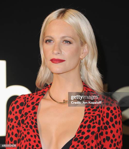 Model Poppy Delevingne arrives at the Panthere De Cartier Party In LA at Milk Studios on May 5, 2017 in Los Angeles, California.