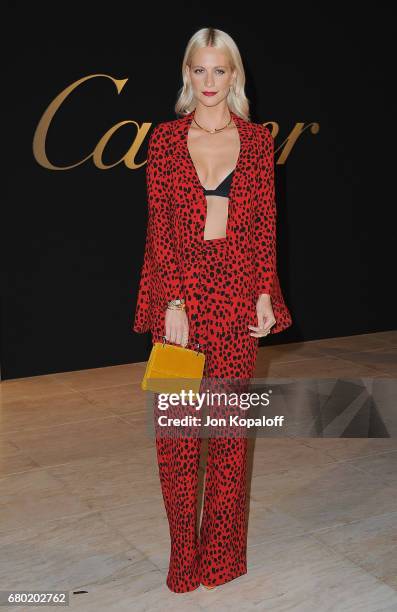 Model Poppy Delevingne arrives at the Panthere De Cartier Party In LA at Milk Studios on May 5, 2017 in Los Angeles, California.