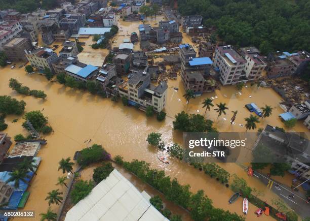 This photo taken on May 7, 2017 shows flooded streets in Guangzhou's Zengcheng District, southern China's Guangdong province. Parts of the district...