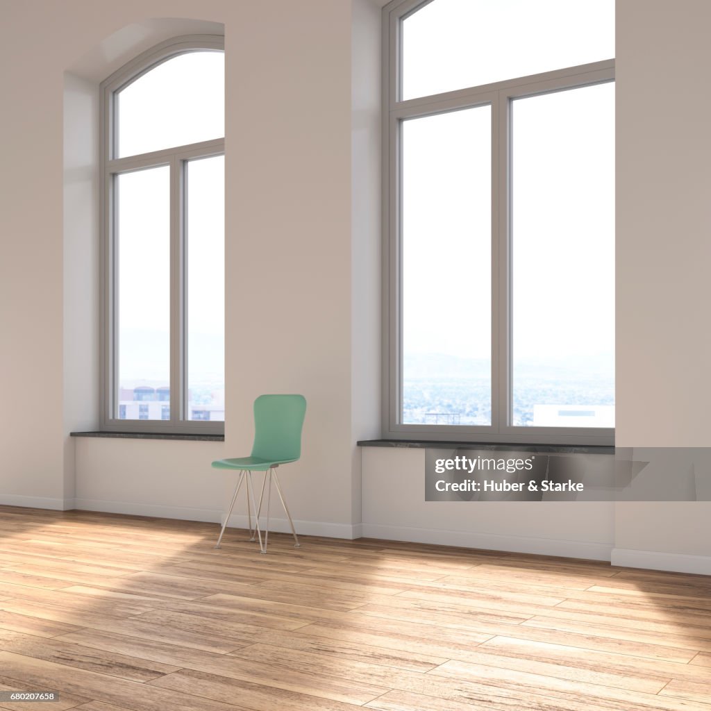 Empty loft with chair and view at skyline