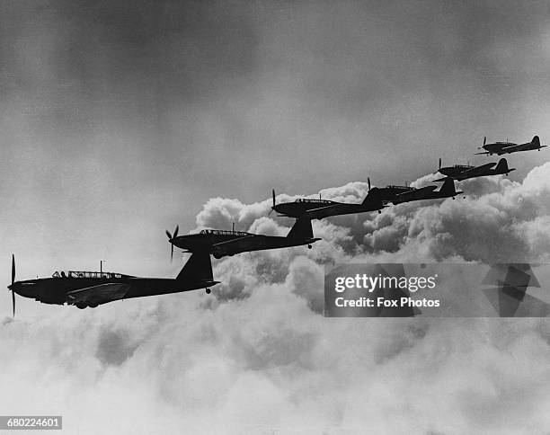 Flight of Royal Air Force Fairey Battle single-engine monoplane light bombers of No.52 Squadron flying in formation in preparation for Empire Air Day...