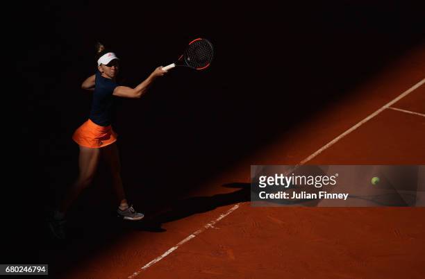 Simona Halep of Romania in action against Kristyna Pliskova of Czech Republic during day two of the Mutua Madrid Open tennis at La Caja Magica on May...