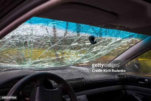 inside of a wrecked car - broken windshield stock-fotos und bilder