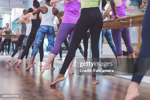 Group of Women Doing Barre Workout Group of Women Doing Barre Workout