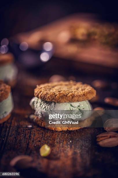 homemade pistachio ice cream sandwich - pistachio ice cream stock pictures, royalty-free photos & images