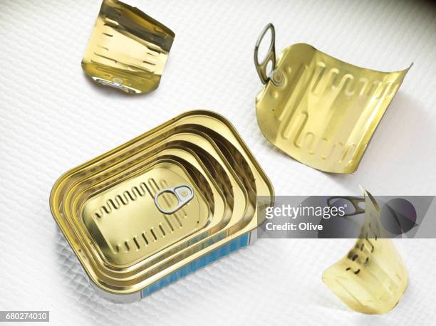 sardines in oil cans disposed as russian dolls - or en métal stock pictures, royalty-free photos & images