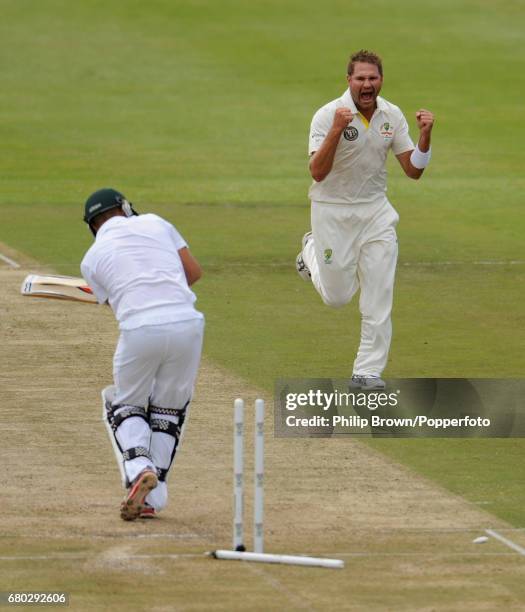 Australia's Ryan Harris celebrates after bowling Jacques Rudolph as South Africa were bowled out for 96 before Australia were bowled out for 47...