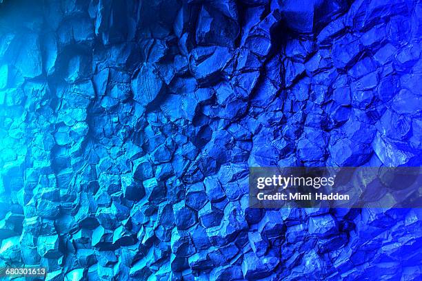 blue colors in basalt cave in iceland - geology pattern stock pictures, royalty-free photos & images