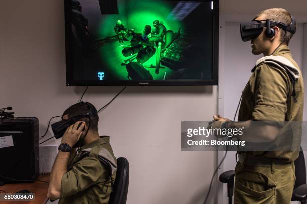 Israeli special combat soldiers conduct a training exercise using virtual reality battlefield technology to simulate Hamas tunnels leading from Gaza...