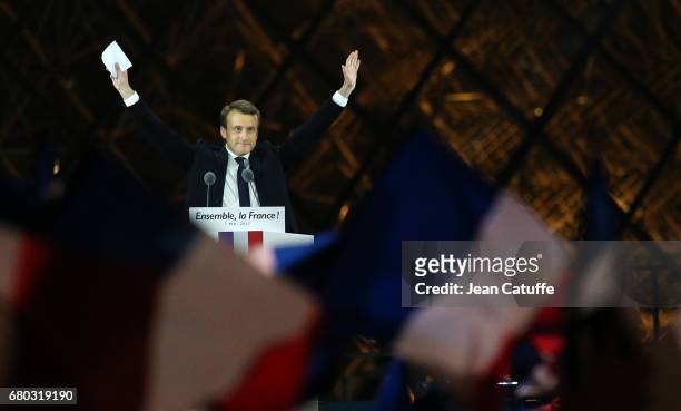 Emmanuel Macron celebrates his presidential election victory at Le Louvre plaza on May 7, 2017 in Paris, France.