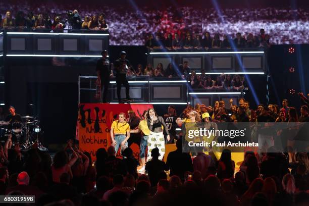 Singer Noah Cyrus performs at the 2017 MTV Movie And TV Awards at The Shrine Auditorium on May 7, 2017 in Los Angeles, California.