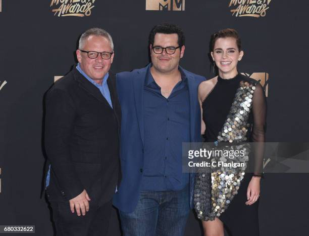 Director Bill Condon and actors Josh Gad and Emma Watson, winners of Movie of the Year for 'Beauty and the Beast', pose in the press room at the 2017...