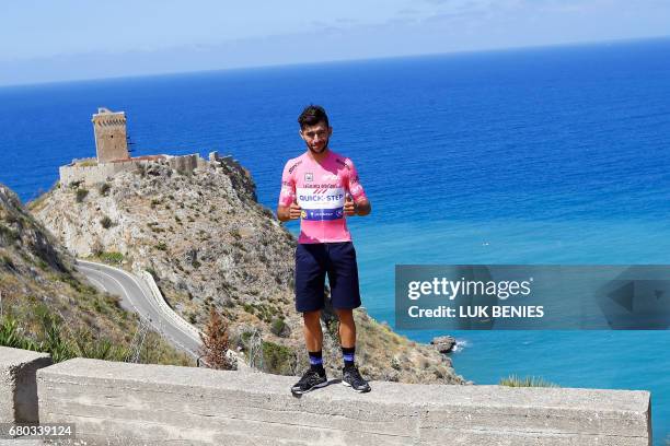 Colombian cyclist Fernando Gaviria of team Quick-Step - Floors poses with the Pink jersey of overall leader during the 1st rest-day of 100th Giro...