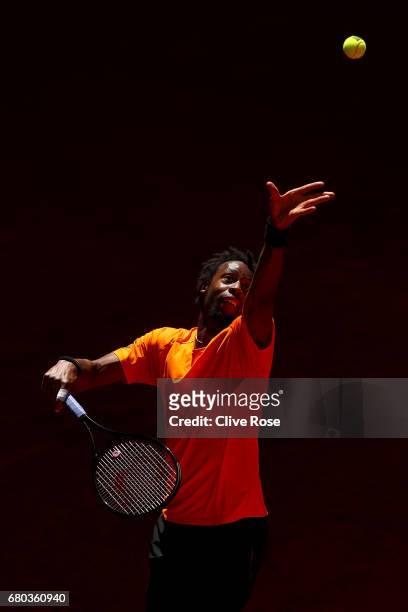 Gael Monfils of France serves during his match against Gilles Simon of France on day three of the Mutua Madrid Open tennis at La Caja Magica on May...