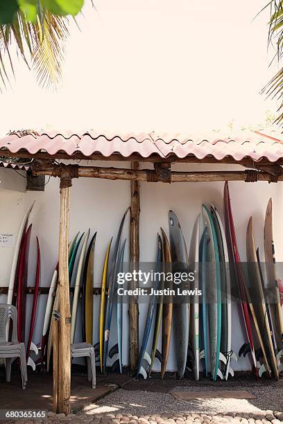 variety of surfboards, waiting to be used - el salvador stock pictures, royalty-free photos & images