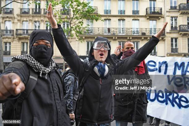 Police control demonstrators on a trade unions demonstrations against the election of Emmanuel Marcon on May 8, 2017 in Paris, France. The centrist...