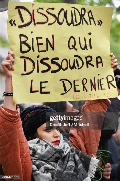Demonstrators take part in a trade unions demonstrations against the election of Emmanuel Marcon on May 8, 2017 in Paris, France. The centrist...