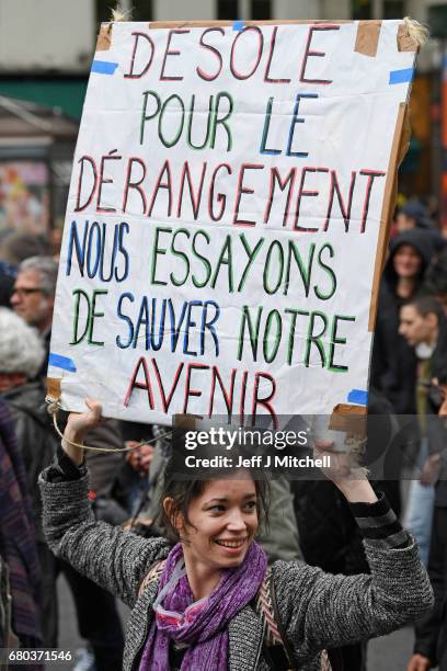 Demonstrators take part in a trade unions demonstrations against the election of Emmanuel Marcon on May 8, 2017 in Paris, France. The centrist...