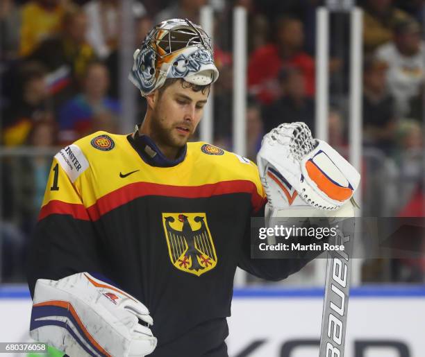 Thomas Greiss of Germany looks dejected during the 2017 IIHF Ice Hockey World Championship game between Germany and Russia at Lanxess Arena on May 8,...